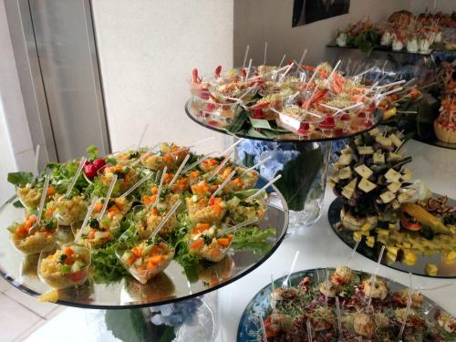 a buffet of different types of food on display at Hotel Byron in Rimini