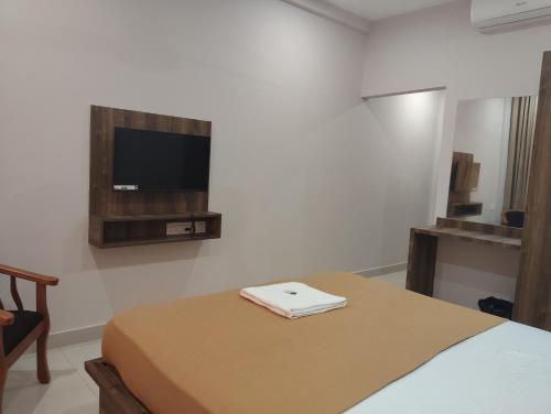 TV a/nebo společenská místnost v ubytování Yacht Residency Kumbla