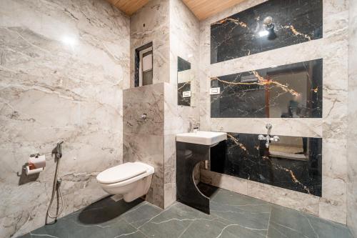 Koupelna v ubytování Forest Arch Resort