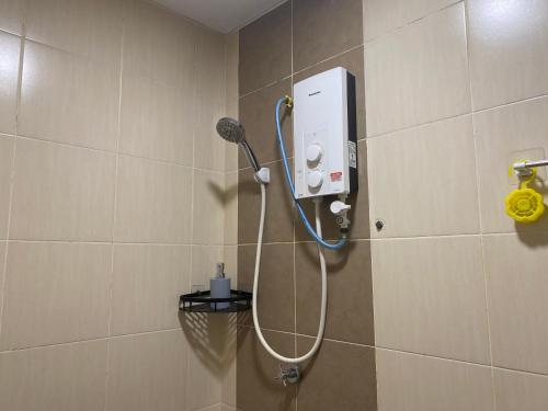 Ένα μπάνιο στο Borneo Hideaway - Manhattan Suites, ITCC