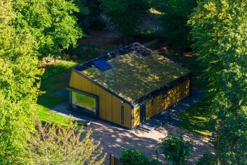 an overhead view of a small house with a green roof at Villa LaVaJu in Landgraaf