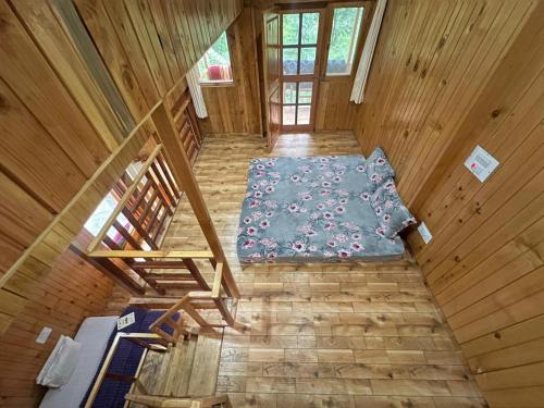 Postel nebo postele na pokoji v ubytování Cedarwood Cottage