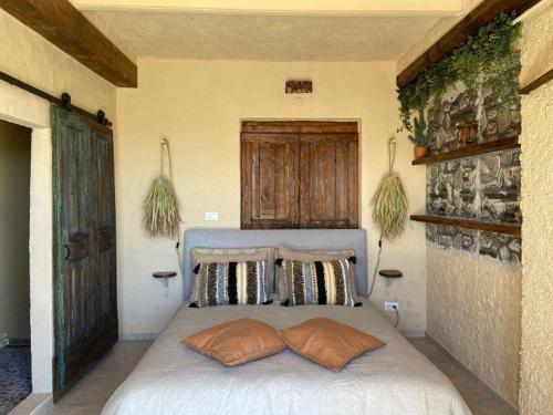 Ένα ή περισσότερα κρεβάτια σε δωμάτιο στο Tramontana Camera Vista