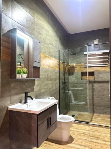 Koupelna v ubytování Maison Olive residence