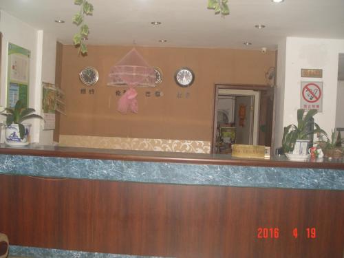 The lobby or reception area at Taizhou Taishan Business Hotel