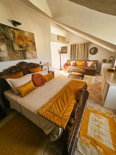 a bedroom with a large bed in a room at Le Chalet di Tabarka in Tabarka