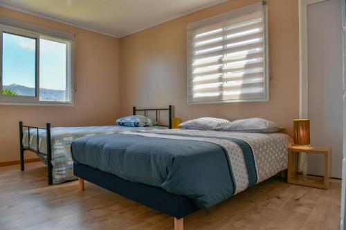 Postel nebo postele na pokoji v ubytování Le Caltha