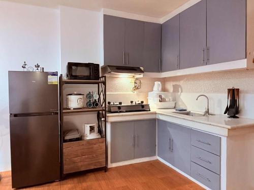 Η κουζίνα ή μικρή κουζίνα στο The Terrace Condominium