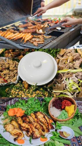 a bunch of different types of food on a table at Mely Farm Mường Lò in Văn Chấn