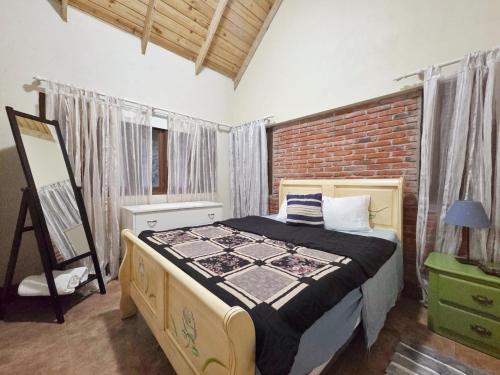 Ένα ή περισσότερα κρεβάτια σε δωμάτιο στο Teonil