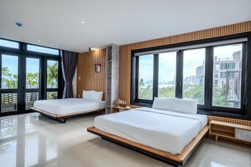 Ένα ή περισσότερα κρεβάτια σε δωμάτιο στο Svy Ocean View Villa - Beachfront - Only 20m to the Beach