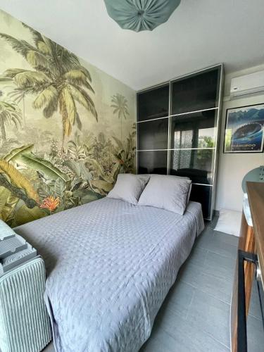 Tempat tidur dalam kamar di Le Loft