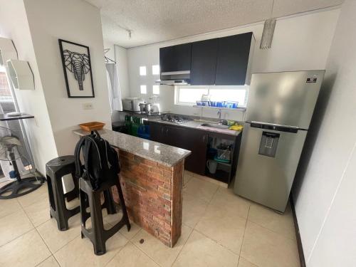 Kuchyň nebo kuchyňský kout v ubytování Apartasol santafe live