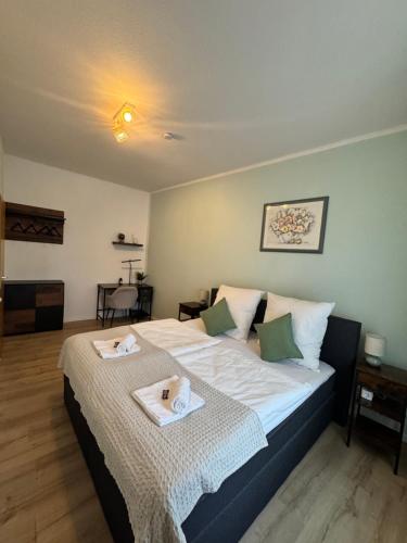 Ένα ή περισσότερα κρεβάτια σε δωμάτιο στο Arminos Apartment