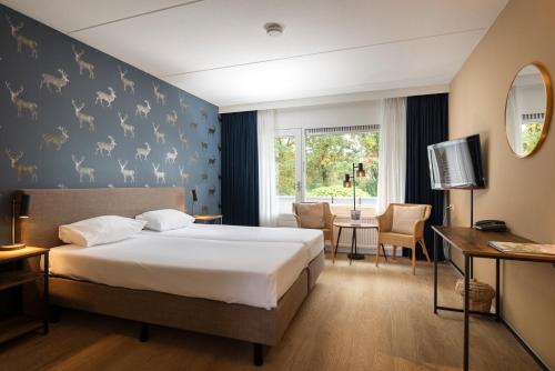 Lova arba lovos apgyvendinimo įstaigoje Hotel Bakker