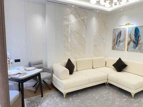 Posezení v ubytování Luxury Apartment at Nest One Residence