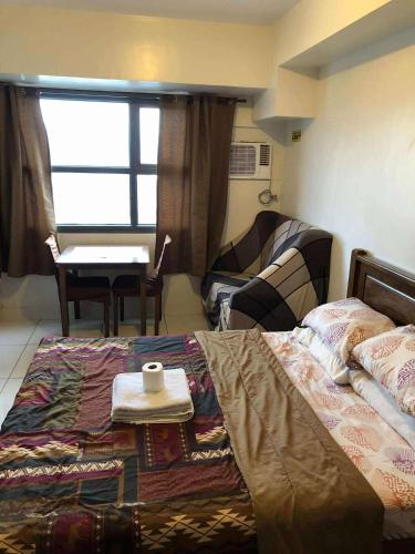 Ένα ή περισσότερα κρεβάτια σε δωμάτιο στο Carlota247