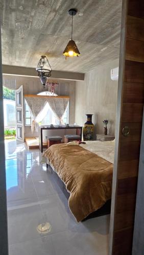 Postel nebo postele na pokoji v ubytování Vila Carmen Imperial