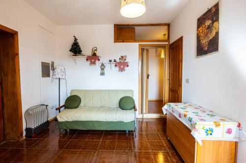 Ένα ή περισσότερα κρεβάτια σε δωμάτιο στο Il Rifugino