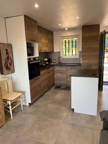 Appartement avec jardin et cuisine d'été