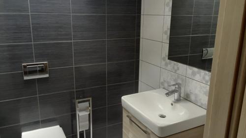 Koupelna v ubytování Grey House