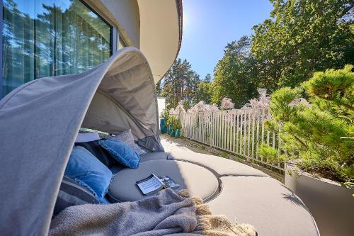 a tent is set up outside of a house at Solmare Luxury Apartment in Świnoujście