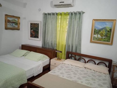 Ένα ή περισσότερα κρεβάτια σε δωμάτιο στο La chulinga