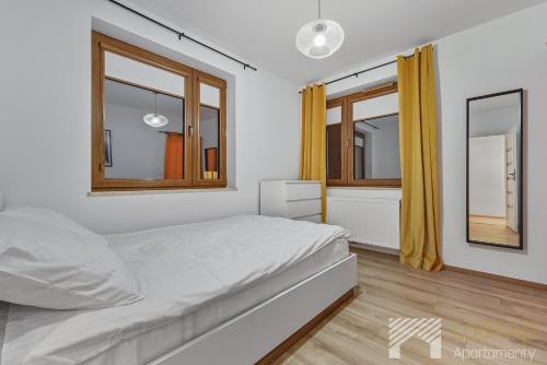 Postel nebo postele na pokoji v ubytování Nowa Praga by LookAp - darmowy parking!