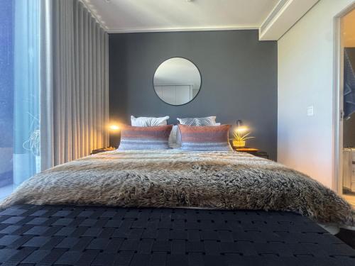 Ένα ή περισσότερα κρεβάτια σε δωμάτιο στο City Slick Hideaway