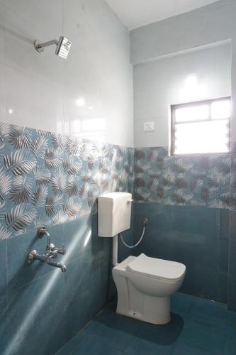 Koupelna v ubytování Hotel Royal Inn Dehu