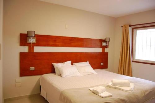 Cama o camas de una habitación en Terra Iguazú Suites