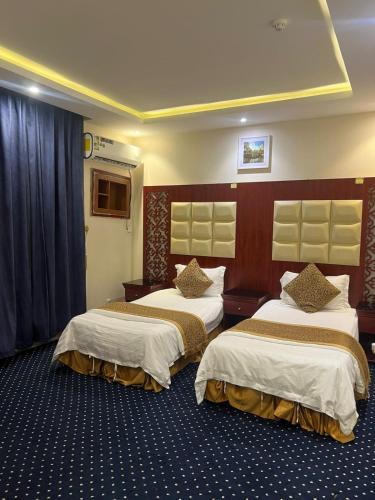 Ένα ή περισσότερα κρεβάτια σε δωμάτιο στο hotel asis altaaj