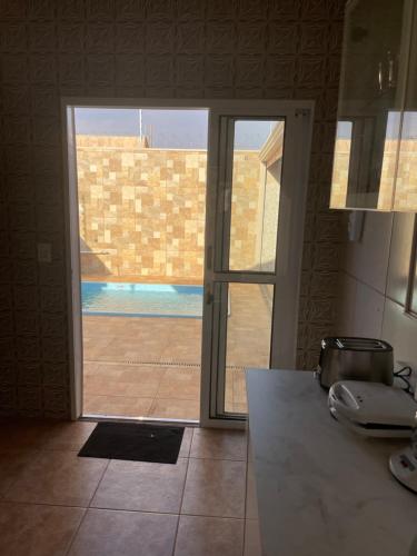 Bazén v ubytování Solar Miranda Olímpia SP Thermas dos Laranjais nebo v jeho okolí