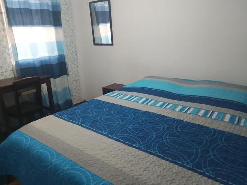 Katil atau katil-katil dalam bilik di Constitucional