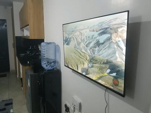 Μια τηλεόραση ή/και κέντρο ψυχαγωγίας στο Amazing StaysBnB near JKIA