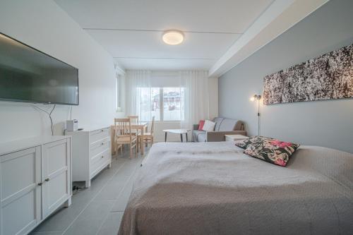 Postel nebo postele na pokoji v ubytování Sisu Stay Studio Jetset Levi