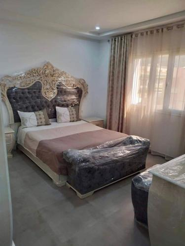 Postel nebo postele na pokoji v ubytování Dar zoghlami