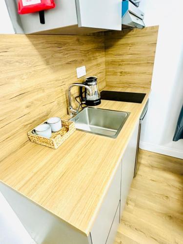 Η κουζίνα ή μικρή κουζίνα στο Nottingham Forest The City Ground Studio Apartments