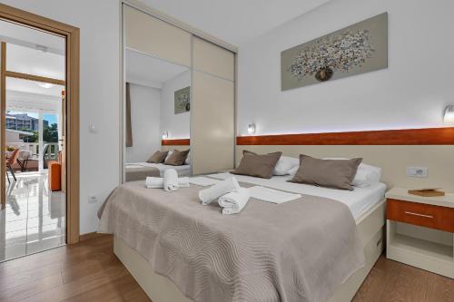 Postelja oz. postelje v sobi nastanitve Apartmani Podest II