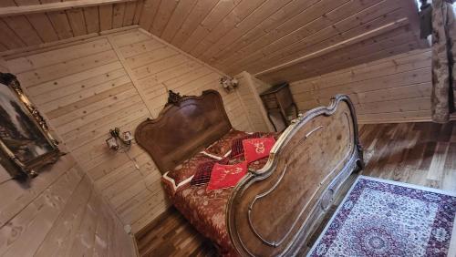 an overhead view of a bed in a room at Domek góralski z sauną i jacuzzi 2 in Kościelisko