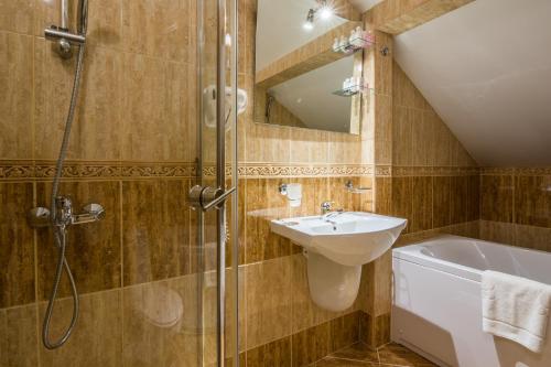 Koupelna v ubytování Hotel Aris