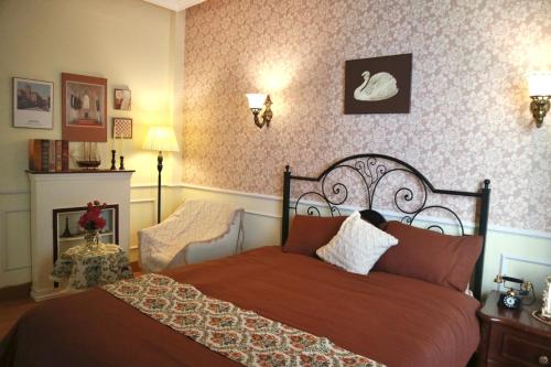 Postel nebo postele na pokoji v ubytování Yên Art Homestay