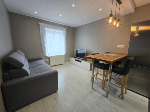 Χώρος καθιστικού στο Appartement proche Walibi