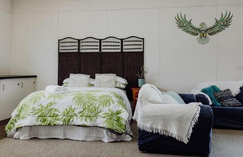 Ένα ή περισσότερα κρεβάτια σε δωμάτιο στο The Lilly Pad - Hokitika