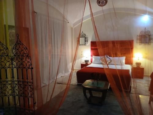 Postel nebo postele na pokoji v ubytování Paradise house