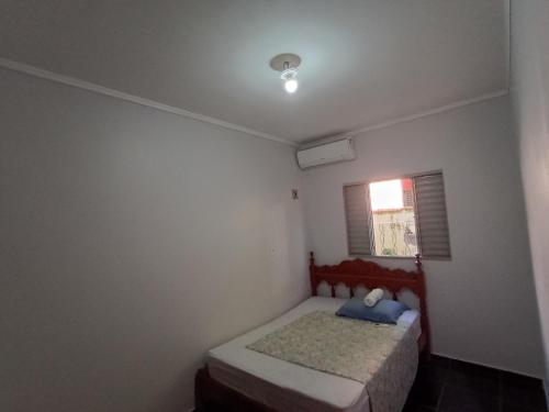 Postel nebo postele na pokoji v ubytování Casa de Gente Feliz