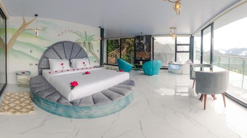 Khu vực ghế ngồi tại Pachamama Ecolodge Baños de Agua Santa