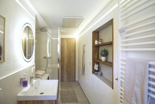 Koupelna v ubytování Haus Schiller