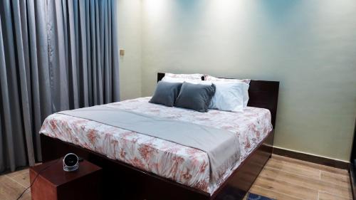 Giường trong phòng chung tại DAV Hills