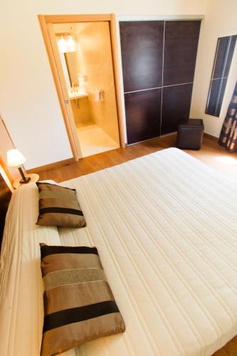 Postel nebo postele na pokoji v ubytování Hotel Cesario